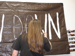Painting the "I Should Slow Down" banner